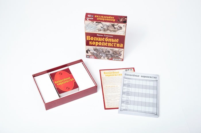 Коробка и компоненты настольной игры Волшебные королевства